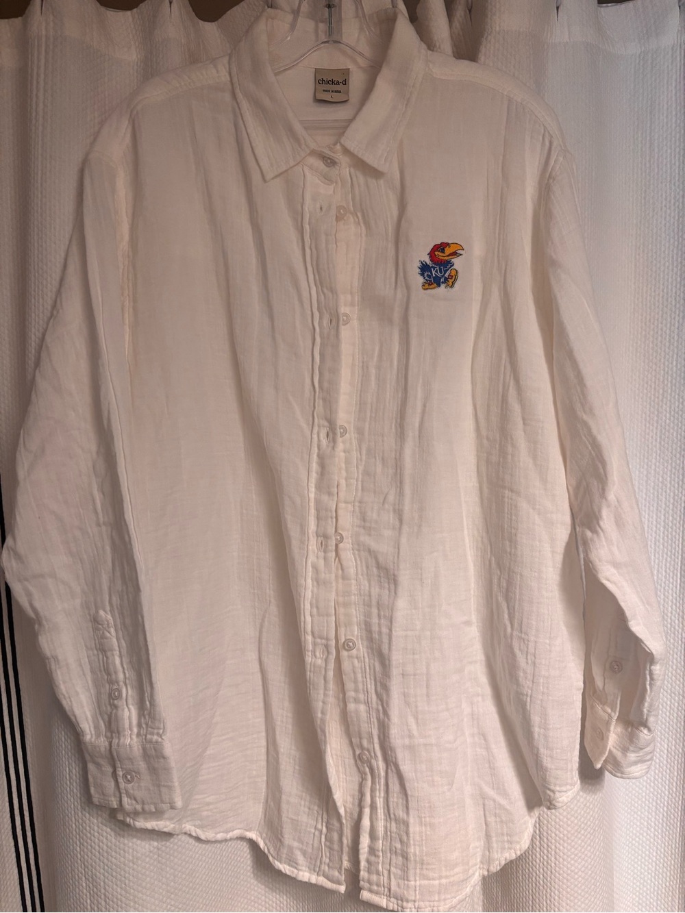 University of Kansas (KU) white long sleeved button down women’s shirt